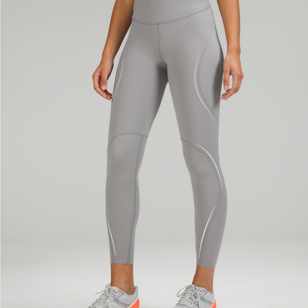 Lululemon base pace high rise reflective tights 25in